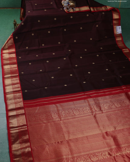 Pure kanchipuram silk saree deep maroon and red with zari woven buttas and zari woven korvai border