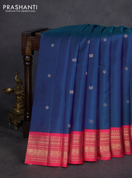Pure kanchipuram silk saree blue and pink shade with zari woven buttas and zari woven korvai border