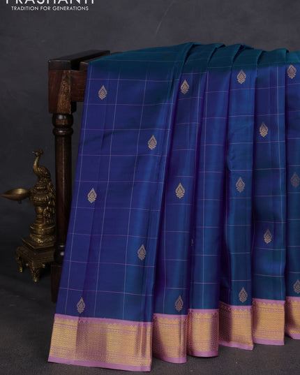 Pure kanchipuram silk saree dual shade of blue and lavender with allover checks & buttas and zari woven korvai border