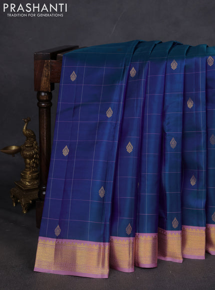 Pure kanchipuram silk saree dual shade of blue and lavender with allover checks & buttas and zari woven korvai border