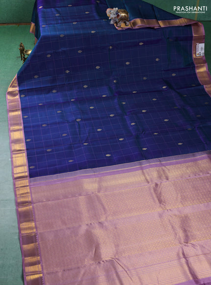Pure kanchipuram silk saree dual shade of blue and lavender with allover checks & buttas and zari woven korvai border