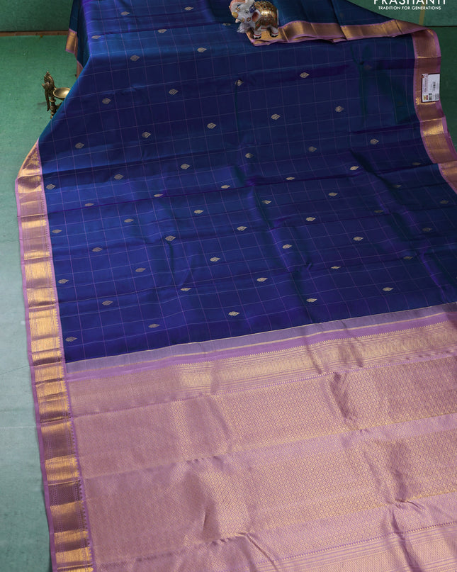 Pure kanchipuram silk saree dual shade of blue and lavender with allover checks & buttas and zari woven korvai border