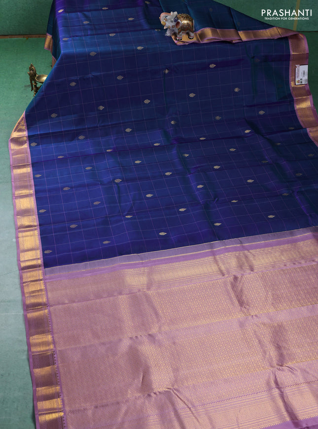 Pure kanchipuram silk saree dual shade of blue and lavender with allover checks & buttas and zari woven korvai border