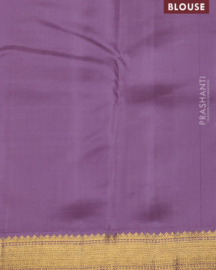 Pure kanchipuram silk saree dual shade of blue and lavender with allover checks & buttas and zari woven korvai border