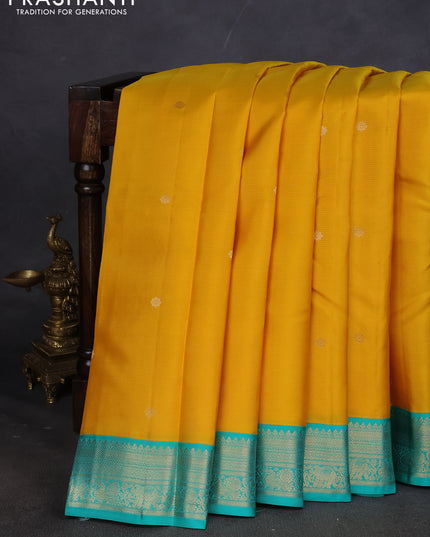 Pure kanchipuram silk saree mustard yellow and teal blue with allover zari weaves & buttas and zari woven korvai border