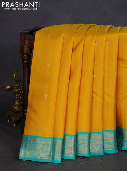 Pure kanchipuram silk saree mustard yellow and teal blue with allover zari weaves & buttas and zari woven korvai border
