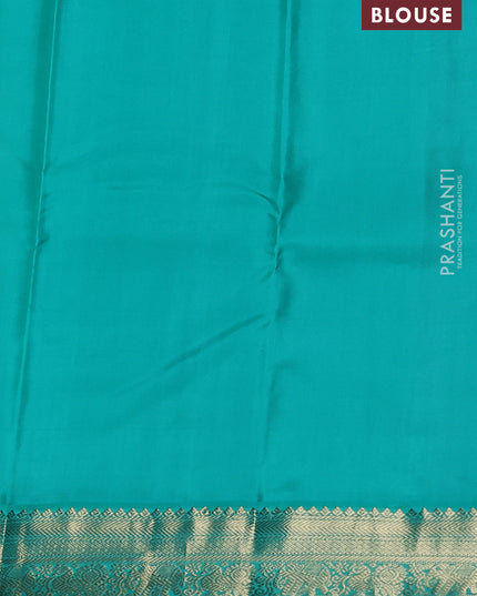 Pure kanchipuram silk saree mustard yellow and teal blue with allover zari weaves & buttas and zari woven korvai border