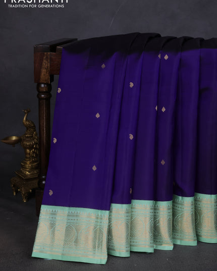 Pure kanchipuram silk saree blue and teal shade with zari woven buttas and zari woven korvai border