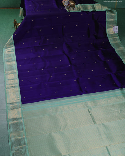 Pure kanchipuram silk saree blue and teal shade with zari woven buttas and zari woven korvai border