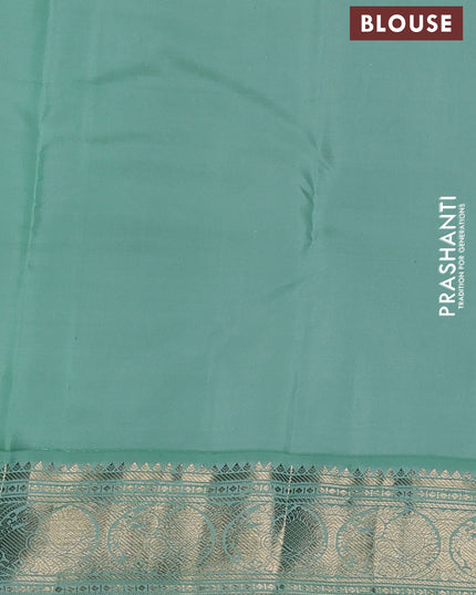 Pure kanchipuram silk saree blue and teal shade with zari woven buttas and zari woven korvai border
