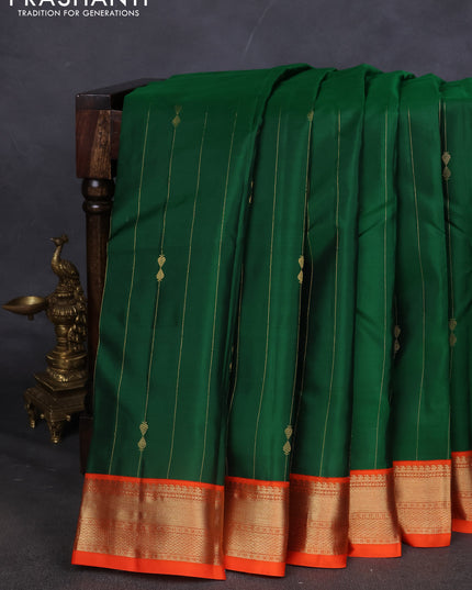 Pure kanchipuram silk saree green and orange with allover zari weaves & buttas and zari woven korvai border