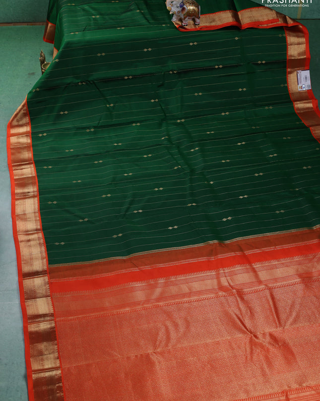 Pure kanchipuram silk saree green and orange with allover zari weaves & buttas and zari woven korvai border