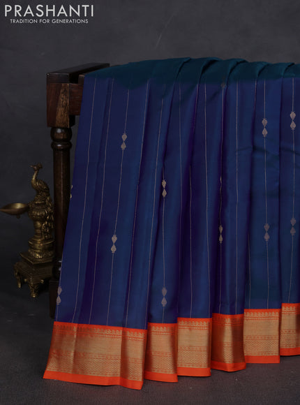 Pure kanchipuram silk saree dual shade of blue and orange with allover zari weaves & buttas and zari woven korvai border