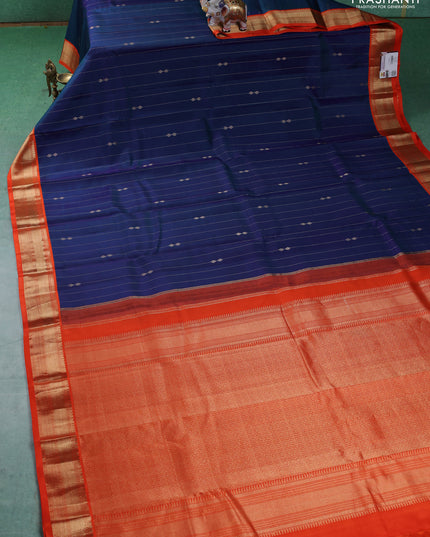 Pure kanchipuram silk saree dual shade of blue and orange with allover zari weaves & buttas and zari woven korvai border