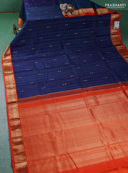 Pure kanchipuram silk saree dual shade of blue and orange with allover zari weaves & buttas and zari woven korvai border