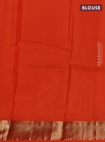 Pure kanchipuram silk saree dual shade of blue and orange with allover zari weaves & buttas and zari woven korvai border