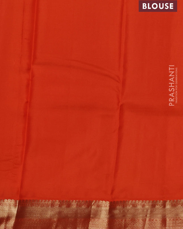 Pure kanchipuram silk saree dual shade of blue and orange with allover zari weaves & buttas and zari woven korvai border