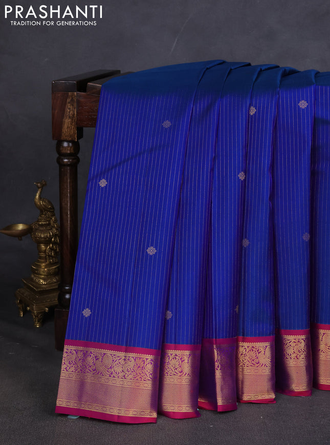 Pure kanchipuram silk saree blue and magenta pink with allover zari weaves & buttas and zari woven korvai border