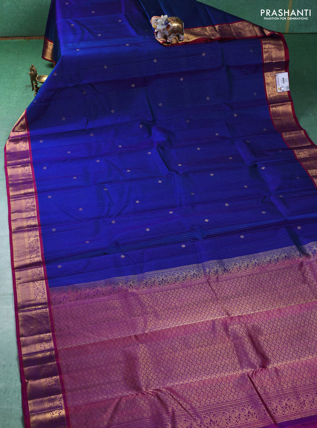 Pure kanchipuram silk saree blue and magenta pink with allover zari weaves & buttas and zari woven korvai border