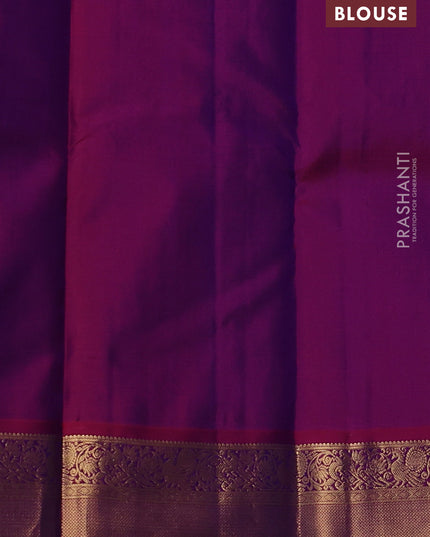 Pure kanchipuram silk saree blue and magenta pink with allover zari weaves & buttas and zari woven korvai border