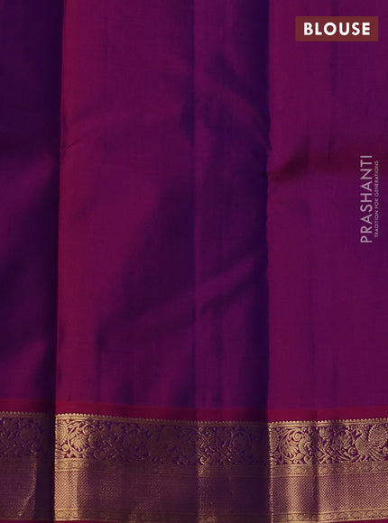Pure kanchipuram silk saree blue and magenta pink with allover zari weaves & buttas and zari woven korvai border