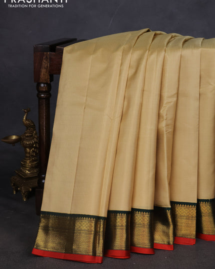 Pure kanchipuram silk saree sandal and green with allover zari weaves and zari woven korvai border
