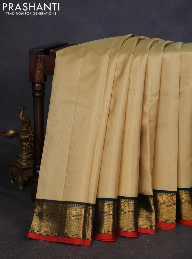 Pure kanchipuram silk saree sandal and green with allover zari weaves and zari woven korvai border