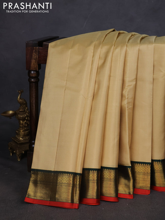 Pure kanchipuram silk saree sandal and green with allover zari weaves and zari woven korvai border