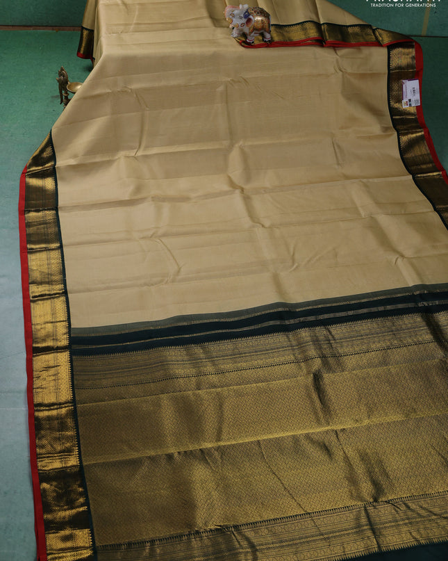 Pure kanchipuram silk saree sandal and green with allover zari weaves and zari woven korvai border