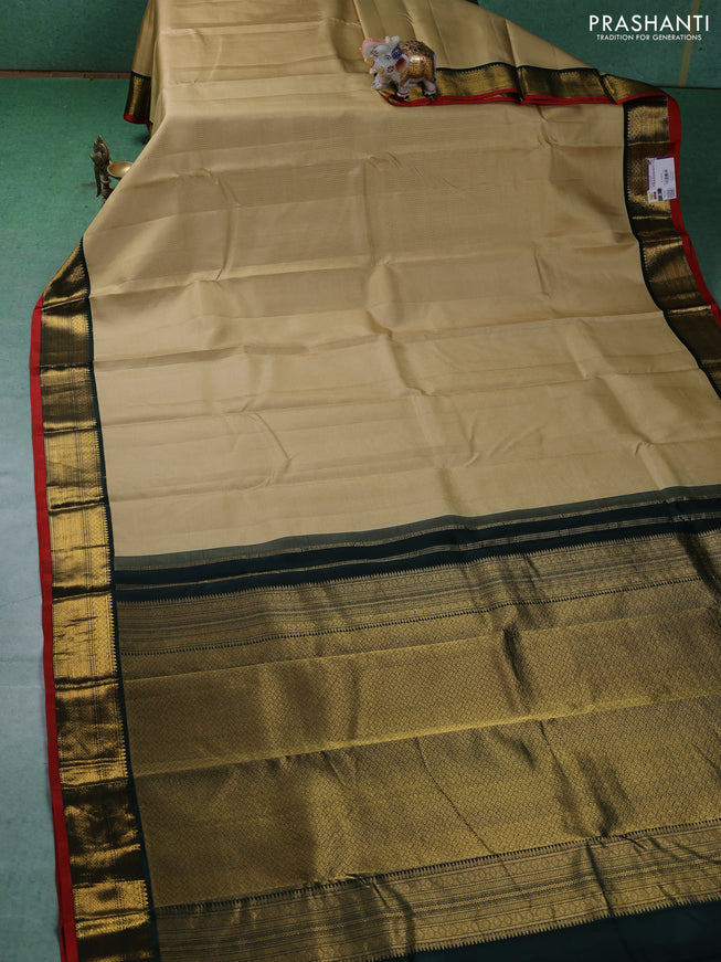 Pure kanchipuram silk saree sandal and green with allover zari weaves and zari woven korvai border