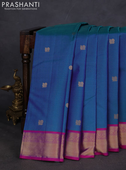 Pure kanchipuram silk saree peacock blue and purple with allover zari checks & buttas and zari woven border