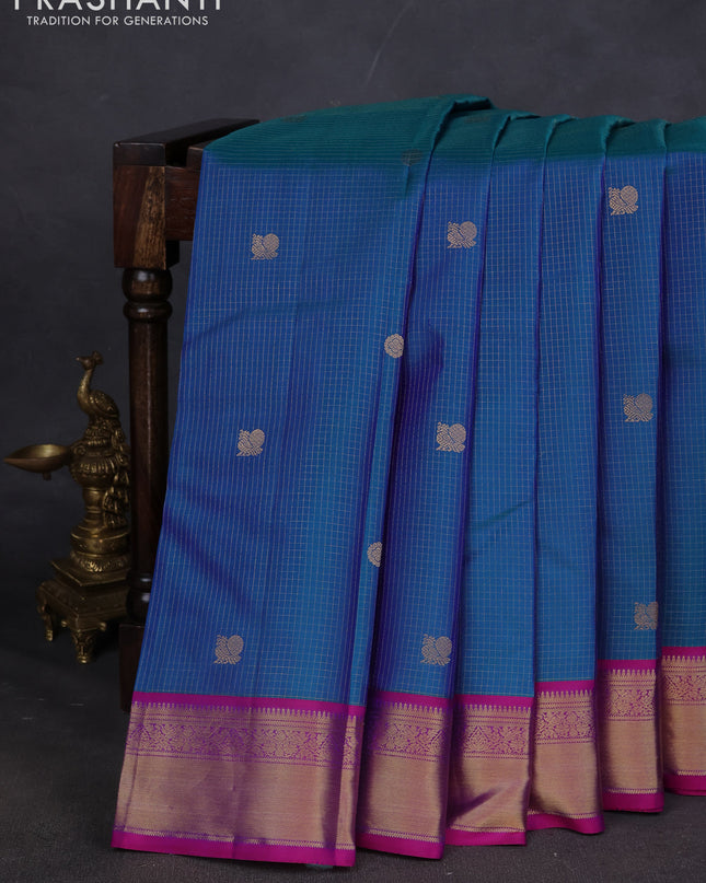 Pure kanchipuram silk saree peacock blue and purple with allover zari checks & buttas and zari woven border