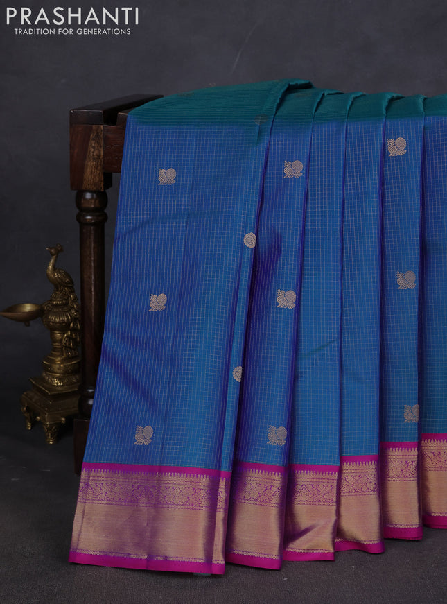 Pure kanchipuram silk saree peacock blue and purple with allover zari checks & buttas and zari woven border