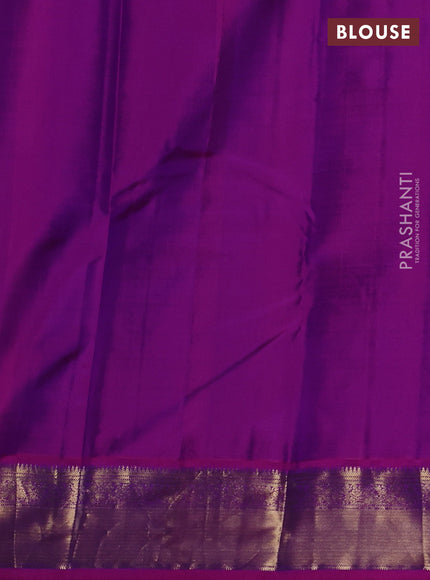 Pure kanchipuram silk saree peacock blue and purple with allover zari checks & buttas and zari woven border