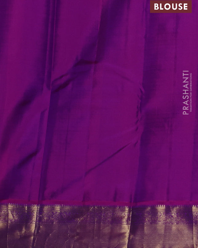 Pure kanchipuram silk saree peacock blue and purple with allover zari checks & buttas and zari woven border