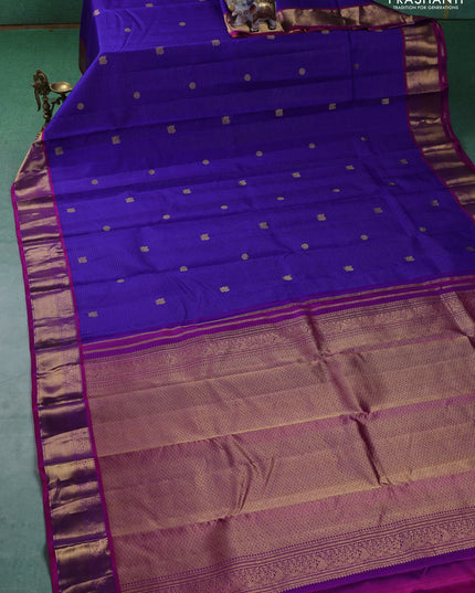 Pure kanchipuram silk saree blue and magenta pink with allover zari checks & buttas and zari woven border