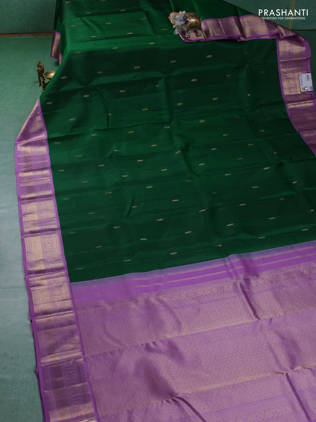 Pure kanchipuram silk saree green and lavender with zari woven buttas and zari woven korvai border