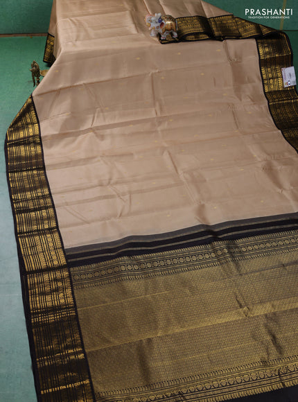Pure kanchipuram silk saree beige and coffee brown with zari woven buttas and zari woven korvai border