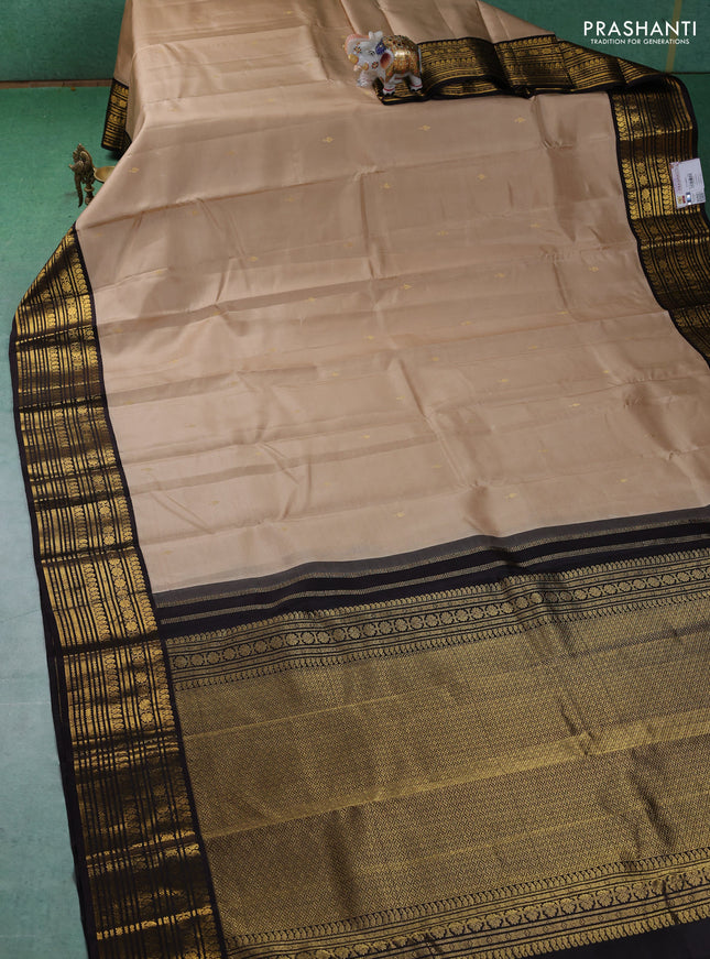 Pure kanchipuram silk saree beige and coffee brown with zari woven buttas and zari woven korvai border
