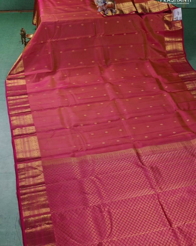 Pure kanchipuram silk saree dual shade of pinkish yellow and pink with zari woven buttas and zari woven border