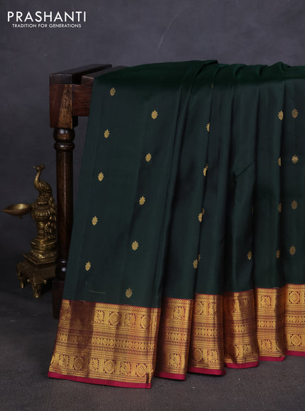 Pure kanchipuram silk saree bottle green and dark magenta with zari woven buttas and zari woven border
