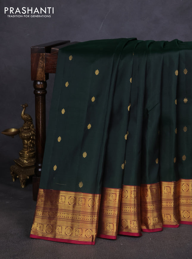 Pure kanchipuram silk saree bottle green and dark magenta with zari woven buttas and zari woven border
