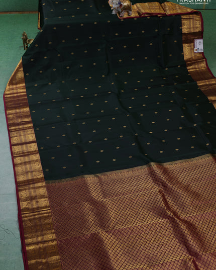 Pure kanchipuram silk saree bottle green and dark magenta with zari woven buttas and zari woven border