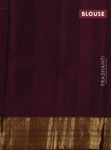 Pure kanchipuram silk saree bottle green and dark magenta with zari woven buttas and zari woven border