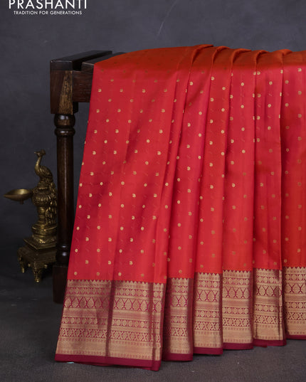 Pure kanchipuram silk saree pinish orange and dark magenta with zari woven buttas and zari woven border