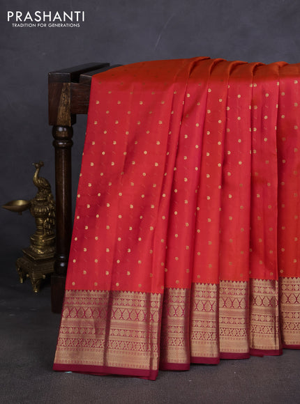 Pure kanchipuram silk saree pinish orange and dark magenta with zari woven buttas and zari woven border