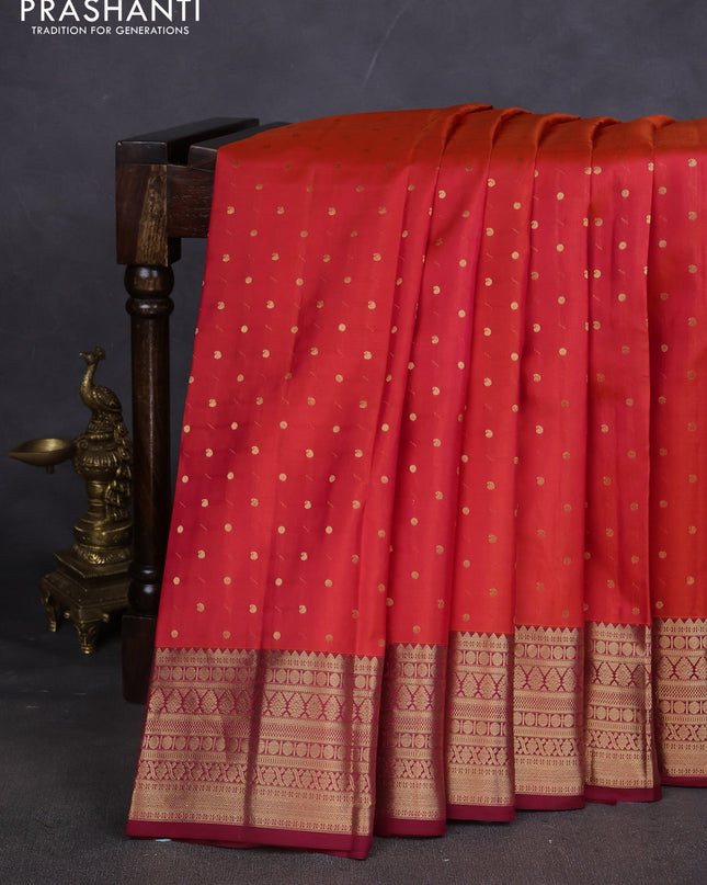 Pure kanchipuram silk saree pinish orange and dark magenta with zari woven buttas and zari woven border