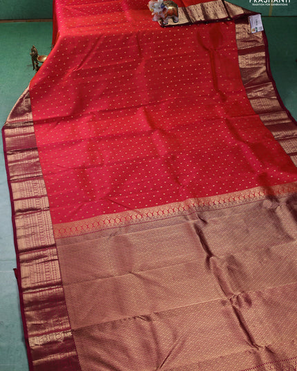 Pure kanchipuram silk saree pinish orange and dark magenta with zari woven buttas and zari woven border