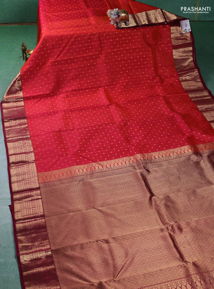 Pure kanchipuram silk saree pinish orange and dark magenta with zari woven buttas and zari woven border