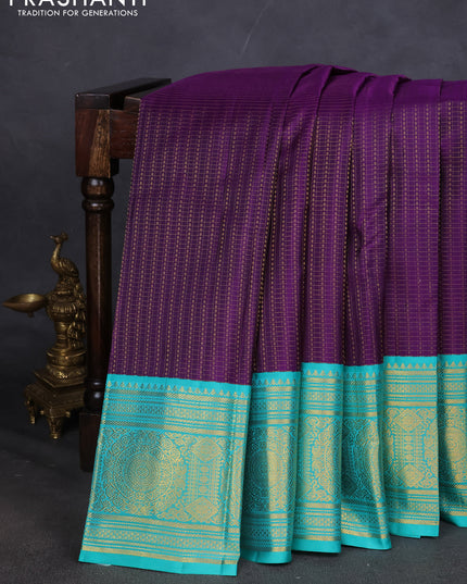 Pure kanchipuram silk saree purple and teal blue with allover zari checks & butta weaves and long zari woven korvai border